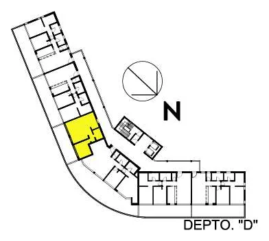 Plano llave: el departamento D, en amarillo, dentro de la planta del edificio